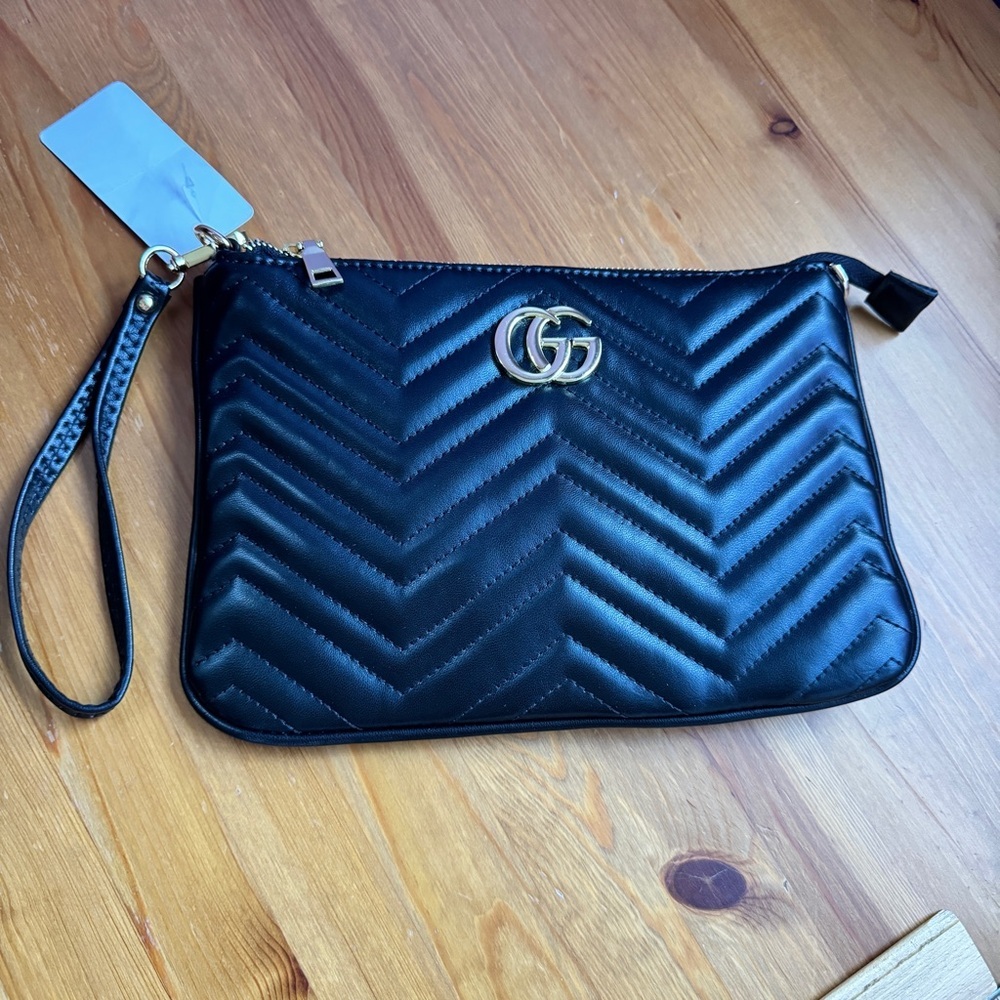 Black quilted crossbody/wristlet